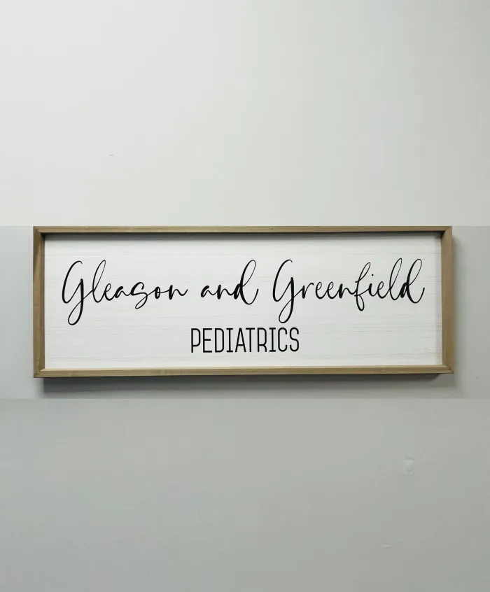 Gleason and Greenfield Pediatrics wooden sign